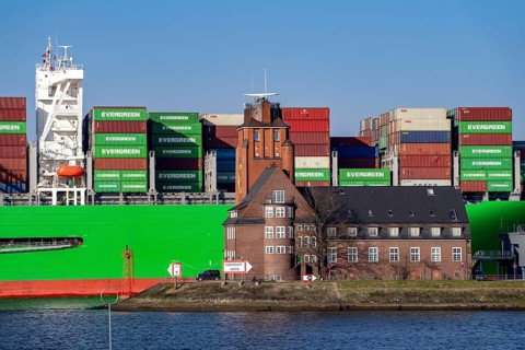 Container ship Ever Gifted, enters the port of Hamburg on the Elbe, shipping company Evergreen,