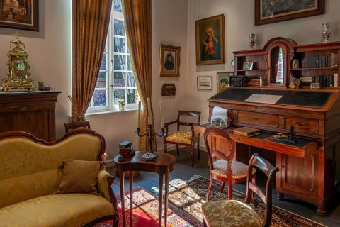 Antique, secretary desk inside 18th century clergy house Schriek at recreated village in open air