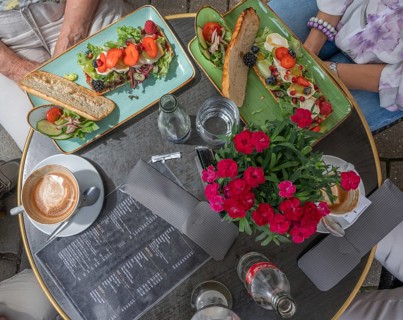 Sheep's cheese au gratin served on a bistro table in a café, Franconia, Bavaria, Germany, Europe