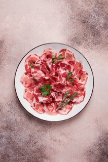 Sliced cured ham, prosciutto, italian dish, delicacy, parma ham, top view, no people