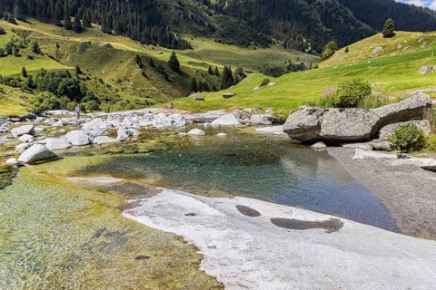 Rein da Christallina torrent near Medel. Pools with crystal-clear water in the riverbed. Canton of