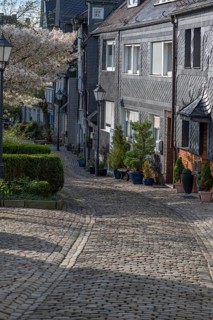 Cobbled old town alleyway with historic slate houses, Siegen, North Rhine-Westphalia, Germany,