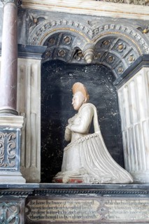 Woman kneeling family memorial monument, Kedington church, Suffolk, England, UK, Grissell