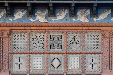 Historic façade with decorative bird reliefs and geometric patterns, Carlsberg Museum,