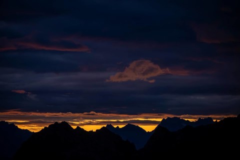 Montafon mountains with dramatic cloudy sky at sunrise, Tschagguns, Rätikon, Montafon, Vorarlberg,