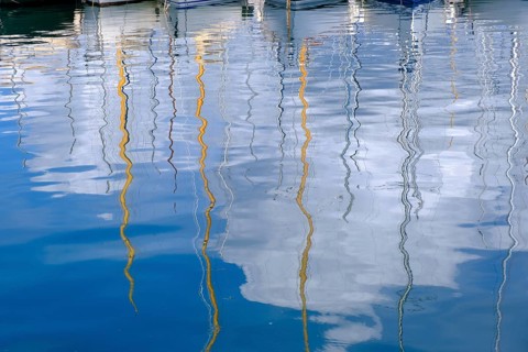 Water reflection, sailing boats in the harbour of Saint Tropez, Var, French Riviera,