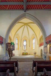 Pulpit, altar, crucifix and baptismal font, late Gothic Protestant-Lutheran town church of St