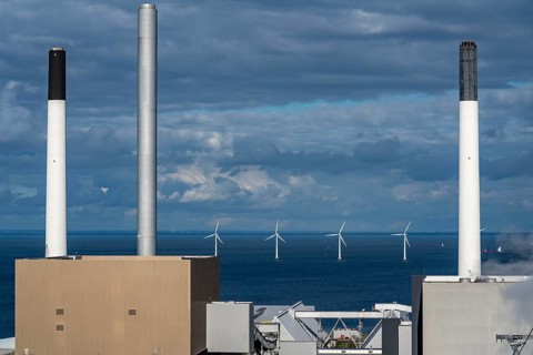 Wind turbines, offshore wind farm east of Copenhagen, in the Øresund, Amager power station is a