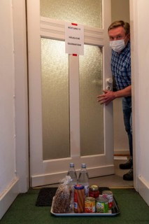 Symbolic image Domestic quarantine, man is in isolation at home due to a suspected corona