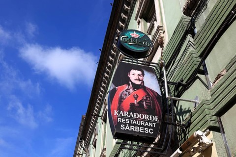 Restaurant sign on a historic house, Romania, Banat, Timisoara, Timisoara, Europe