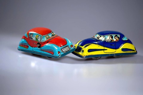 Road traffic, automobile, collision, depicted with model cars made of tin, old, old, tin toy,