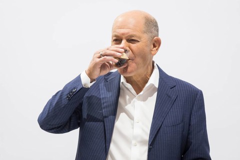 Olaf Scholz (Chancellor of the Federal Republic of Germany, SPD) drinks an espresso during a press