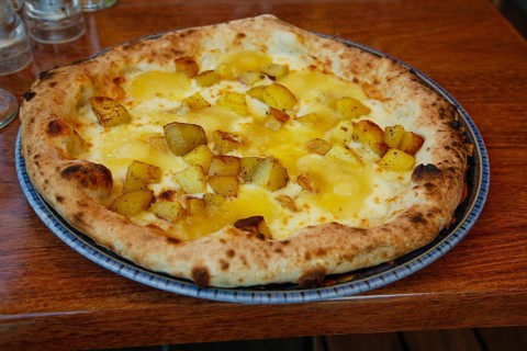 Italian cuisine, Mediterranean cuisine, pizza with potatoes and cheese, Taleggio, baked, from the
