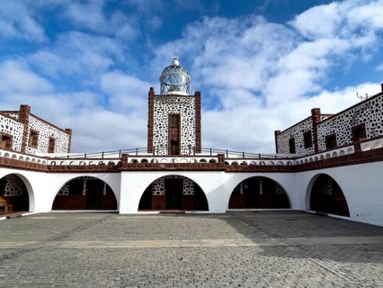 View of inner courtyard of building complex of lighthouse Faro de la Entallada from 50s year 1953