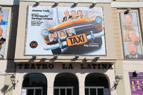 Taxi poster billboard advert, Teatro la Latina theatre playhouse, Madrid city centre, Spain, Europe