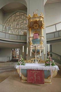 Altar with decorations, crucifix and candles, St Gumbert's Church, interior view, Ansbach, Middle