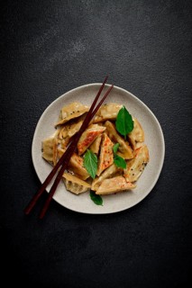 Japanese fried dumplings, gyoza, sesame seeds, top view, no people