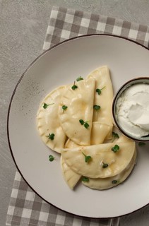 Pierogi, a traditional dish of Polish cuisine, dumplings, top view, close-up, no people