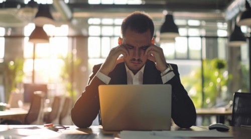 Stressed overworked depressed manager during the decision making process, AI generated