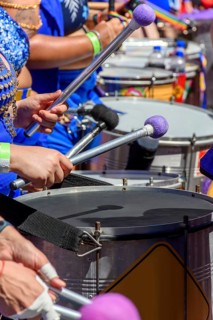 Drums played by women during a street carnival performance in the city of Belo Horizonte, Minas