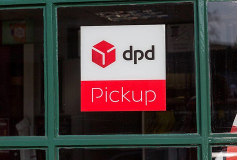 Sign for DPD Pickup, High Street, Marlborough, Wiltshire, England, UK