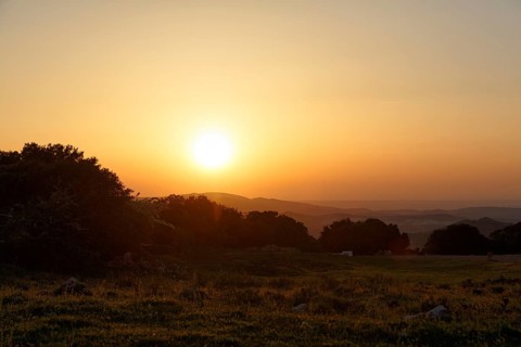 Sunset over mountain range, Sierras Subbeticas Natural Park, near Zuheros, Cordoba province,