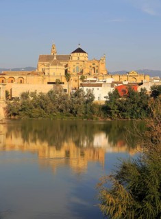 River Rio Guadalquivir and historic Mezquita cathedral buildings, Great Mosque, Cordoba, Spain,