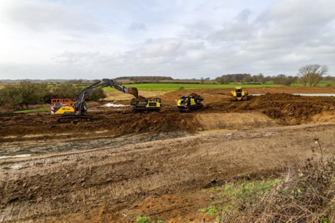 TRU PLANT hire heavy plant machinery constructing new reservoir, Shottisham, Suffolk, England, UK