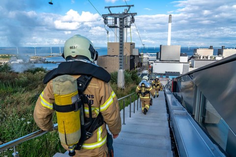 CopenHill, waste incineration plant and artificial ski slope, firefighters under respiratory