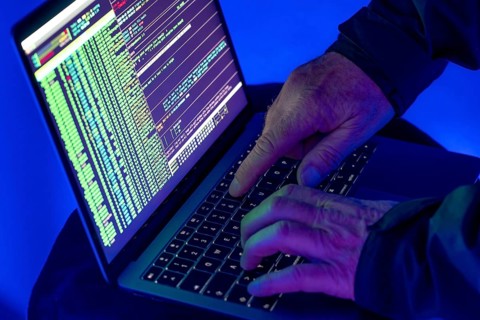 Symbolic image cyber attack, computer crime, cybercrime, computer hackers attack a network,