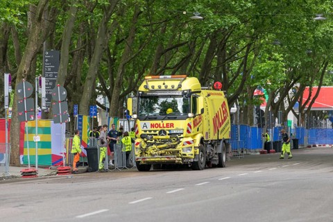 Sweeper cleans the road in front of the MHPArena in Stuttgart, Baden-Württemberg, Germany, Europe