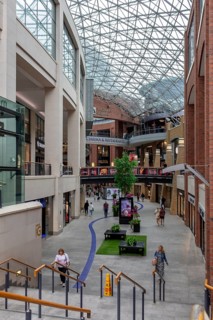 Bright interior of a modern shopping centre with glass ceiling, Belfast