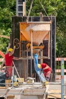 Construction site, concreting, ceiling of a building is concreted, the concrete is placed on the