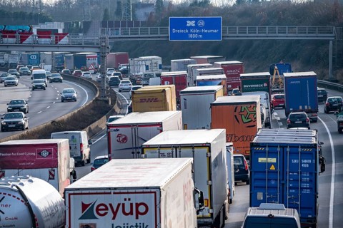 Traffic jam on the A3 motorway, at the Köln-Ost junction, heading south, four lanes jammed with