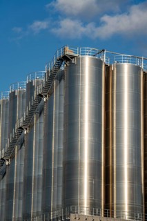 Stainless steel tanks of a large silo facility in Duisburg inland harbour, Duisburg-Neuenkamp, for