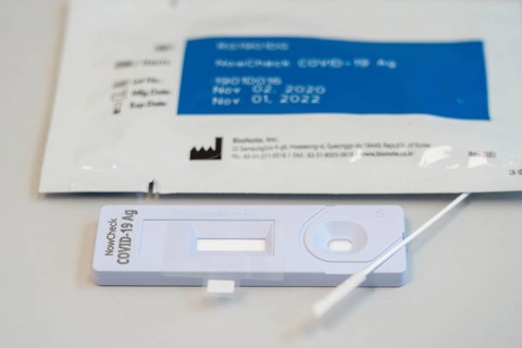 Covid-19 rapid test, antigen test, the abrasion of the swab is dissolved in a liquid and applied to