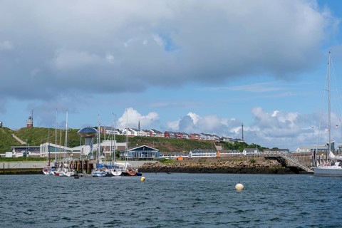 View from south-east to harbour facilities, Unterland and Oberland, offshore island Helgoland, blue