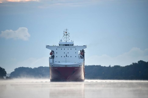 RoRo cargo ship Super Fast Levante travelling through the Kiel Canal at sunrise, Kiel Canal,