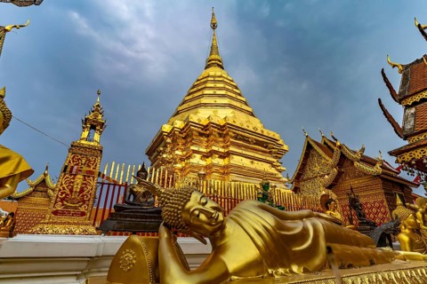 Reclining Buddha and Golden Chedi of the Buddhist temple complex Wat Phra That Doi Suthep, landmark