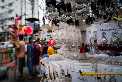 Women buys jewelleries at street market ahead of Durga Puja festival on October 7, 2024 in