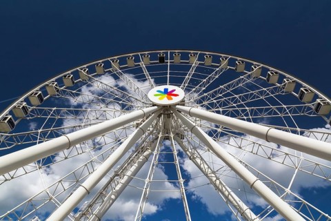 The Montreal Observation Ferris Wheel or La Grande Roue de Montreal amusement ride decorated with
