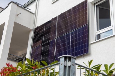 New residential building with solar modules on the façade