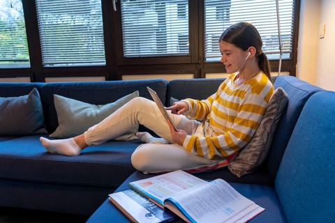 Homeschooling, girl, 11 years old, learns at home, home learning, lessons at home, distance