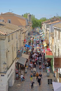 People on the Grand Rue Jean Jaurès and decoration with pennant chain, tourists, strolling,