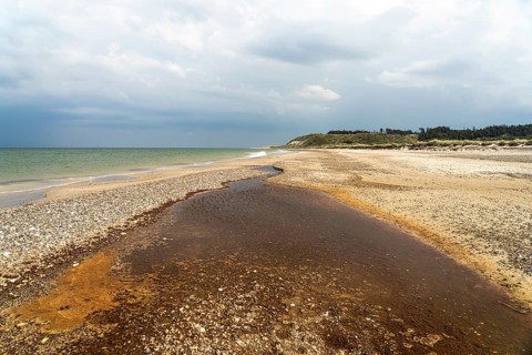 Tidal creek at Grönne Strand on Jammer Bay, Fjerritslev, Denmark, Europe