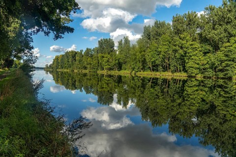 Clouds reflected in the Danube reservoir Faimingen, Lauingen Donau, Bavaria, Germany, Europe
