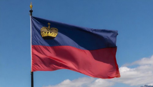 The flag of Liechtenstein flutters in the wind