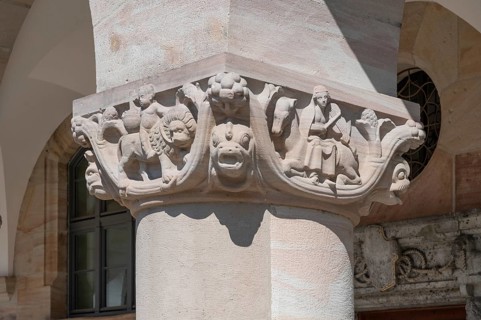 Sculptural reliefs on the columns of the arcade of the courthouse, built between 1909 and 1916 in
