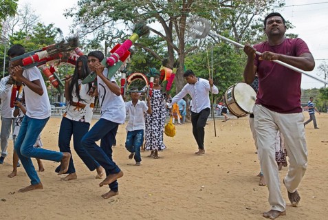 Sri Lankan pilgrims dancing in the Buddhist temple Ruhunu Maha Kataragama Dewalaya, Kataragama, Uva