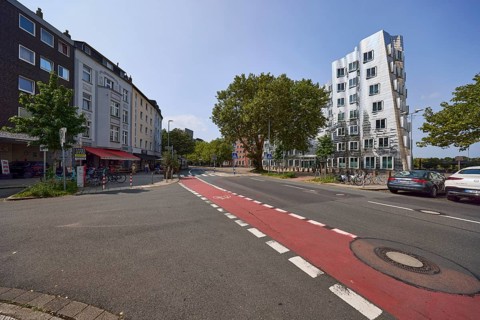 Neuer Zollhof street with residential buildings and Gehry buildings by architect Frank O. Gehry in